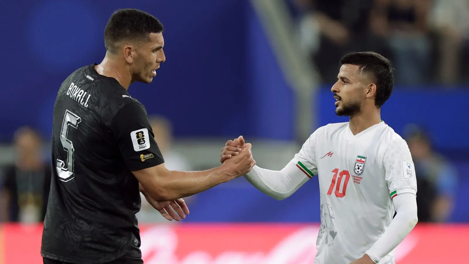 Iran players celebrate their comeback draw against New Zealand at the 2026 World Cup
