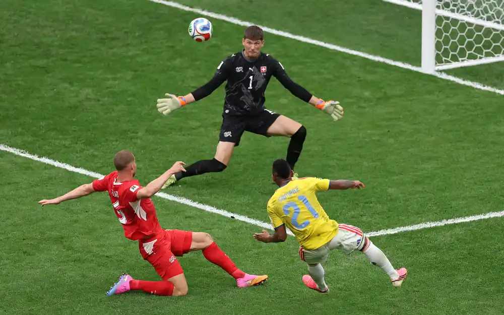 Switzerland and Colombia contest midfield space during their World Cup 2026 round-of-16 match